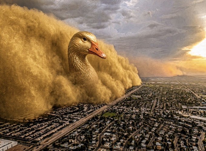 A surreal, digitally created image shows a massive giant goose on a head of sand or dust rolling over a suburban neighborhood under a dramatic, stormy sky.