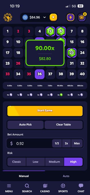 A mobile casino app screenshot showing a number grid game with numbers 1-40, a 90.00x multiplier win of $82.80 highlighted in green, and a bet amount of $0.92 with 'High' risk selected.