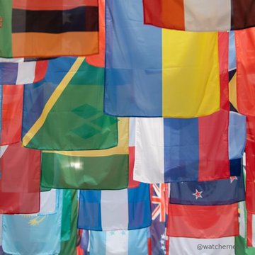 An array of colorful national flags displayed in rows, with the watermark '@watchmen' visible in the bottom right corner.