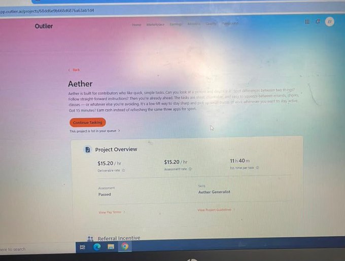 A photograph of a computer monitor displaying the Outlier platform website for an 'Aether' project, showing a Project Overview with a $15.20/hr deliverable rate, $15.20/hr assessment rate, and 11h 40m estimated time per task.