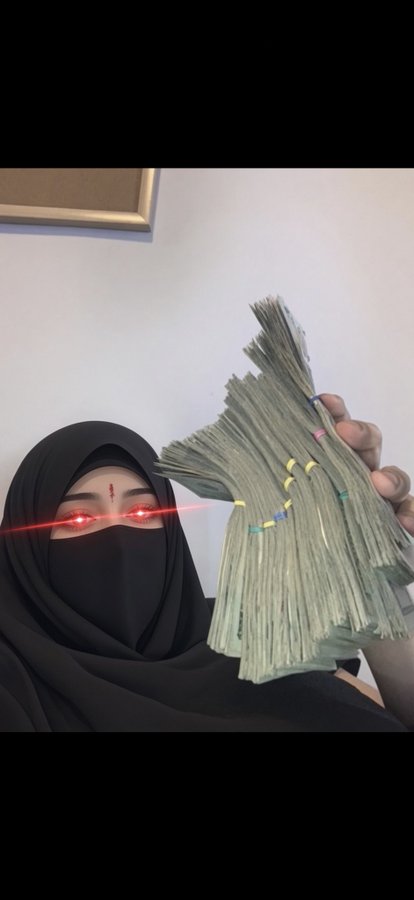 A woman wearing a black niqab and a bindi holds up thick stacks of cash banded with rubber bands, her eyes edited to glow red laser-style. The image appears as proof of an airdrop giveaway, promoting a $4 $SOL crypto reward for engaging with @V2GOATEDDD on a 12-hour timer.