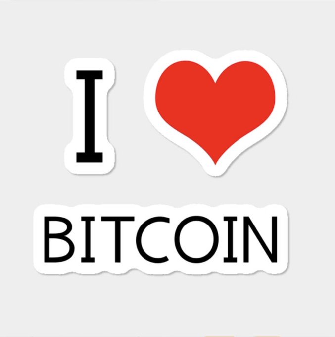 A sticker design reading "I ❤ BITCOIN" with a black "I," a red heart, and bold "BITCOIN" text on a white background, symbolizing enthusiasm for Bitcoin in anticipation of a company ($GPUS) reporting its latest BTC purchases.