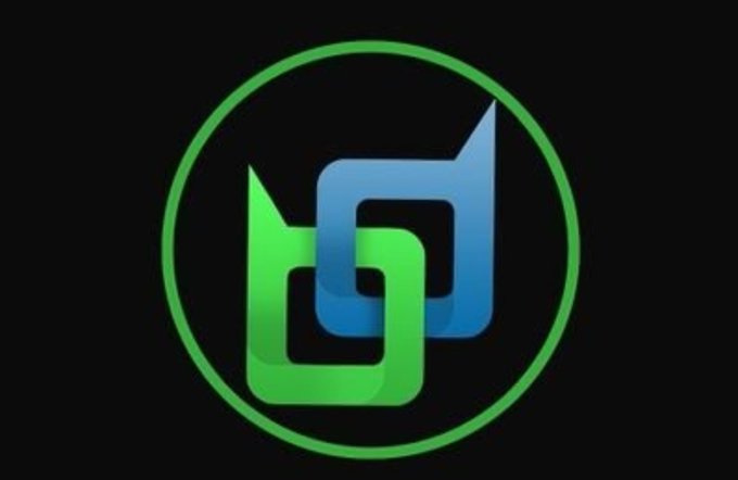 A circular logo containing an interlocking green and blue geometric design on a black background.