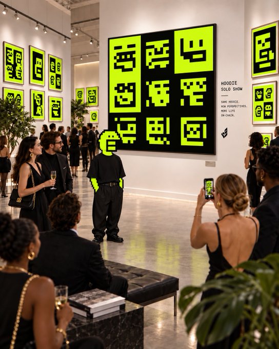 An art gallery scene with a 'HOODIE SOLO SHOW' featuring neon green pixel-art style character designs on black canvases, with a person wearing a matching green pixel mask and hoodie standing in the center while attendees socialize.
