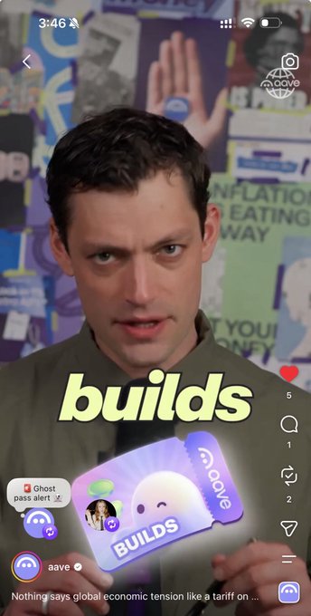 A vertical video screenshot featuring a man speaking with the word "builds" overlaid, with a "aave" sticker, a "Ghost pass alert" comment, and a caption beginning "Nothing says global economic tension like a tariff on..."