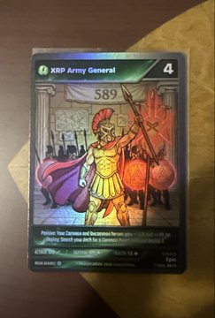 A trading card titled 'XRP Army General' valued at $589 depicts a Roman soldier with XRP-themed shields.