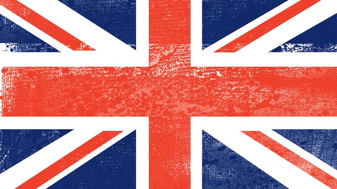 A weathered Union Jack flag represents the United Kingdom, underscoring the post’s announcement that, from April 2027, depositing crypto into eligible DeFi lending protocols and liquidity pools will not trigger Capital Gains Tax unless a genuine gain or loss is realized.