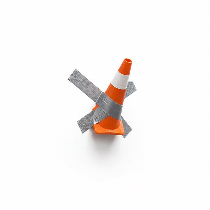 A small orange traffic cone with a white reflective band is taped together in an X-shape with silver duct tape against a white background, conveying a "fix" or repair theme. The image visually represents the message from networked.art/visualizevalue, symbolizing improvised fixes or makeshift solutions to value or structural problems.