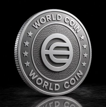 A silver commemorative coin displayed against a dark background, featuring 'WORLD COIN' text around its rim and a stylized 'e' symbol in the center.