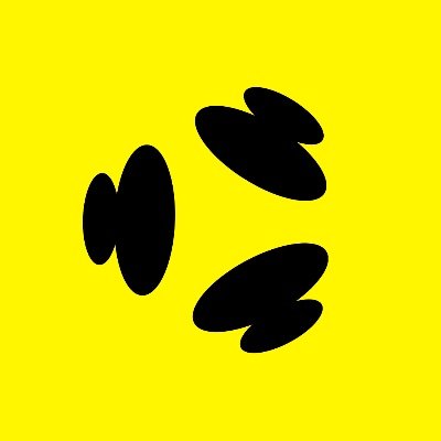 A simple graphic on a bright yellow background showing three black abstract shapes that resemble stylized letters or symbols.