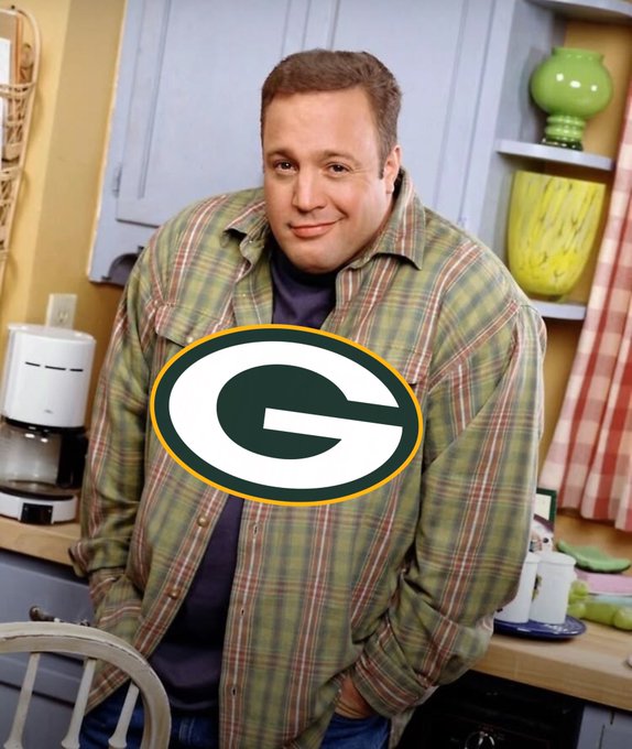 The image shows a man in a green plaid shirt standing in a kitchen, with a Green Bay Packers "G" logo digitally overlaid on his chest. The accompanying post mocks a Packers fan by referencing a loss to "the worst team in the NFL," implying the fan's team suffered an embarrassing defeat.