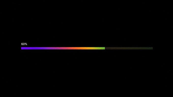 A black screen displays a horizontal progress bar filled to 60% with a rainbow gradient, labeled '60%' on the left side.