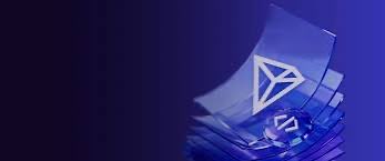 A low-resolution, tilted image displays a blue flag featuring a geometric logo waving against a dark blue sky.