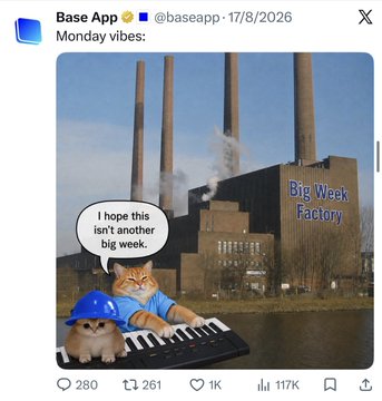 A meme from Base App (@baseapp · 17/8/2026) captioned "Monday vibes:" shows an orange tabby cat wearing a blue shirt and hard hat playing a keyboard in front of the power plant labeled "Big Week Factory," with a speech bubble reading "I hope this isn't another big week." The image playfully reinforces the post's bullish sentiment about $Basecat reaching 9 figures, with the cat meme serving as a mascot for the Base-related crypto community rallying around the token.