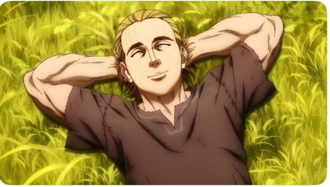 An anime-style illustration of a blonde man lying relaxed in tall green grass with his hands behind his head, wearing a dark brown tunic.