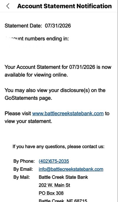 A mobile bank notification from Battle Creek State Bank stating 'Your Account Statement for 07/31/2026 is now available for viewing online,' with contact details and the bank's address in Battle Creek, NE.