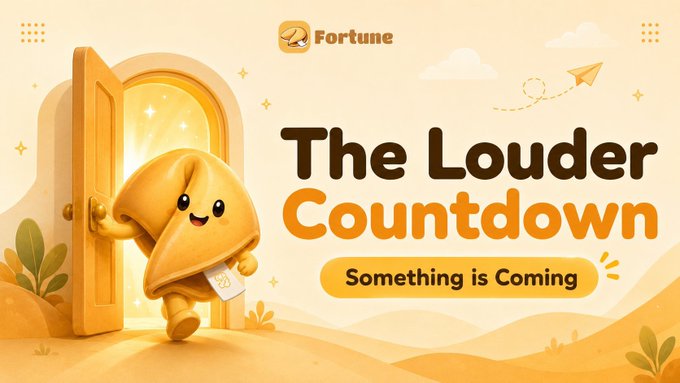 A promotional banner for 'Fortune' featuring a cute fortune cookie character opening a golden door, with the text 'The Louder Countdown' and 'Something is Coming'.