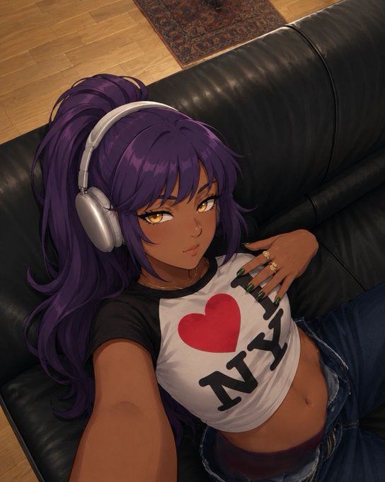 An anime-style illustration of a dark-skinned girl with long purple hair wearing headphones, lying on a black leather couch and wearing a white 'I ❤️ NY' t-shirt.