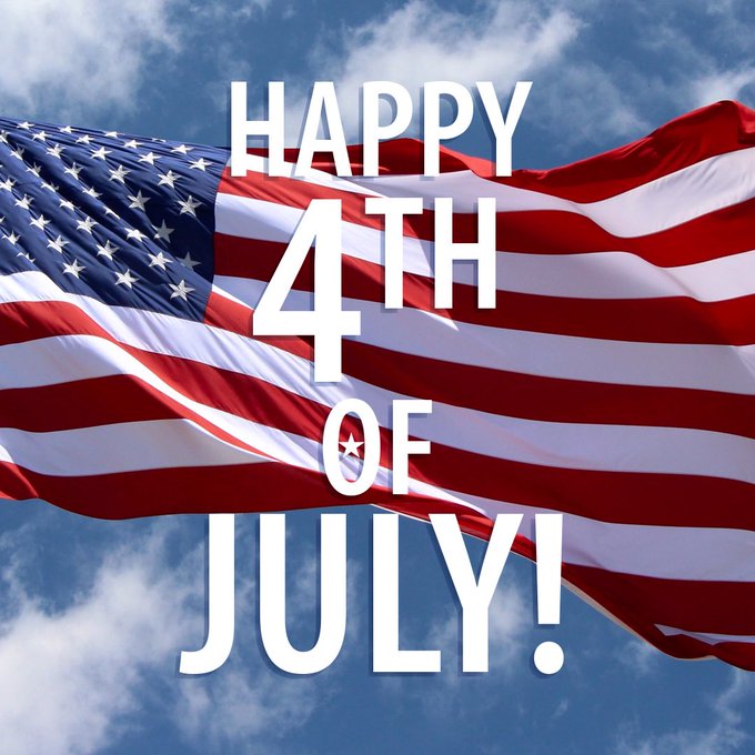 The image shows an American flag waving against a blue sky with white clouds, overlaid with bold white text reading "HAPPY 4TH OF JULY!" The patriotic visual complements the celebratory post wishing the XRP community a happy Independence Day.