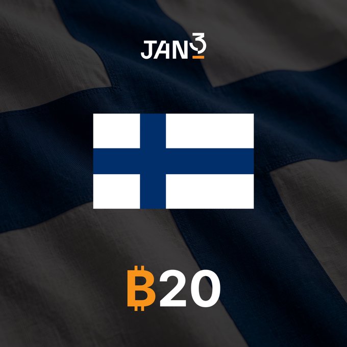 A promotional graphic featuring the Finnish flag overlaid on a waving dark blue fabric background, with 'JAN3' logo at the top and '₿20' (Bitcoin 20) text at the bottom.
