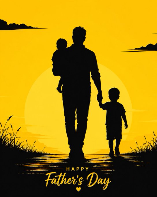 The image features a father holding his two children, one of whom has a baby carrier strapped around their neck. The scene takes place outdoors at sunset, with the father walking along a path near water. In the background, there are clouds visible against the sky. The text "Happy Father's Day" is written in yellow letters above and below the image, indicating that it is a celebration of fatherhood on this special day.