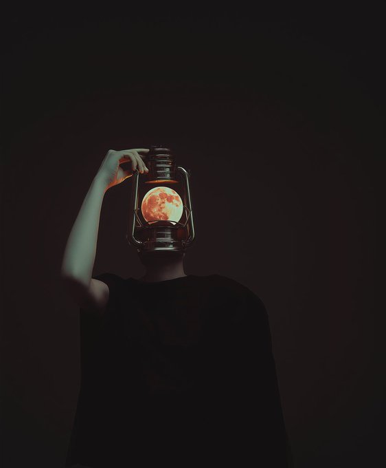 A person holding a lantern with a glowing red moon inside it, their face obscured by the lantern in a dark setting.