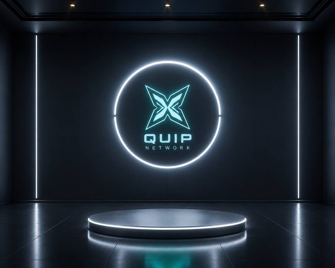 A dark, futuristic stage with a glowing circular neon logo reading 'QUIP NETWORK' featuring an X-shaped emblem, with a podium lit by cyan lights.