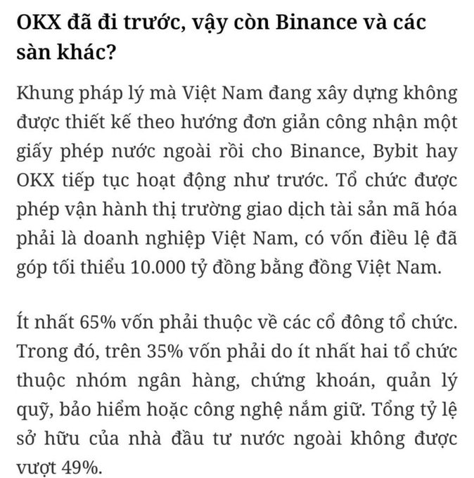A Vietnamese news article discussing Vietnam's crypto regulation framework, noting a requirement of 10,000 billion VND in charter capital and ownership rules for exchanges like Binance, Bybit, and OKX.