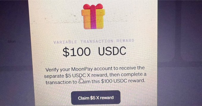 A promotional screen displays a $100 USDC variable transaction reward offer with a gift box icon, instructing users to verify their MoonPay account for a $5 USDC reward before completing a transaction to claim the $100 USDC. The image relates to the post by highlighting one of the multiple rewards (totaling $900 USDC) available through MoonPay transactions.