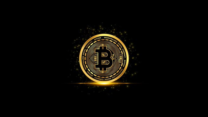 A glowing golden Bitcoin coin centered on a black background with golden sparkles emanating from it.