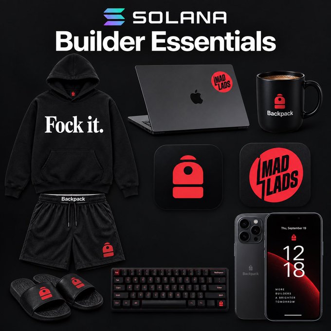 A branded "Solana Builder Essentials" kit display featuring black merchandise with red accents, including a "Fock it." hoodie, shorts, slides, mug, stickers, keyboard, and an iPhone showing "12:18" with "MORE BUILDERS A BRIGHTER TOMORROW." The image showcases the missing items (Backpack laptop, slides, mug, and tech accessories) that complete the Solana builder lifestyle package referenced in the post.