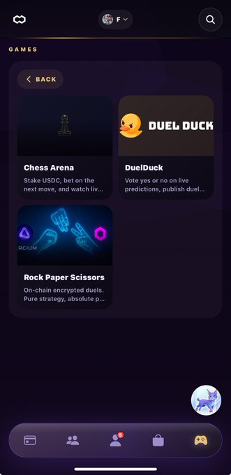 A mobile app interface showing a GAMES menu with options for "Chess Arena" (stake USDC), "DuelDuck" (vote yes/no on live predictions), and "Rock Paper Scissors" (on-chain encrypted duels).