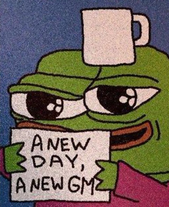 A sad Pepe the Frog meme with a mug on his head holds a sign reading 'A NEW DAY, A NEW GM'.