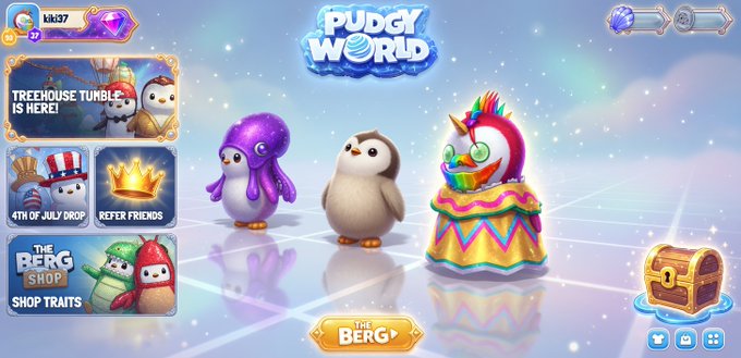 A screenshot from the game 'Pudgy World' featuring cartoon penguin characters, with menus showing 'TREEHOUSE TUMBLE IS HERE!', '4TH OF JULY DROP', 'REFER FRIENDS', and 'THE BERG SHOP'.