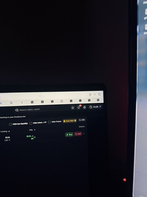 A laptop screen displays a cryptocurrency trading platform showing a portfolio value of $135.10 with 3.0 holding in Solana (SOL) priced at $138.9, alongside a search bar for tokens and wallets, suggesting the user is tracking or preparing to trade their Solana holdings—likely in connection with the giveaway promotion for "trench warriors."