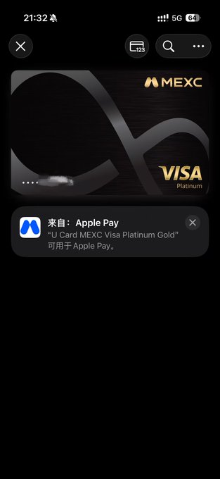 A screenshot from an iPhone showing the Apple Pay wallet displaying a MEXC Visa Platinum Gold card being added, supporting the post's claim about MEXC's new card supporting Apple Pay along with other payment platforms.