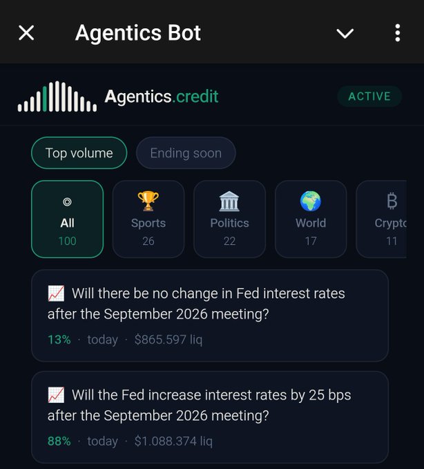 A screenshot of the 'Agentics Bot' interface showing prediction markets for Agentics.credit, with categories including All (100), Sports (26), Politics (22), World (17), and Crypto (11), featuring Fed interest rate predictions for September 2026.
