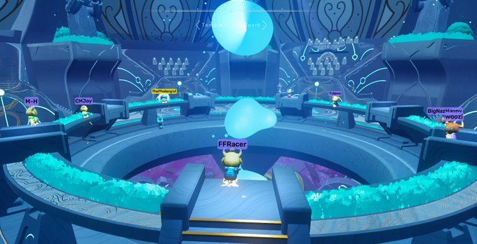 A screenshot from a colorful video game showing an icy blue circular arena with player characters including 'FFRacer', 'Taylen', 'Wooz', 'CM3Joy', 'NightWhimsy', and 'M-H'.