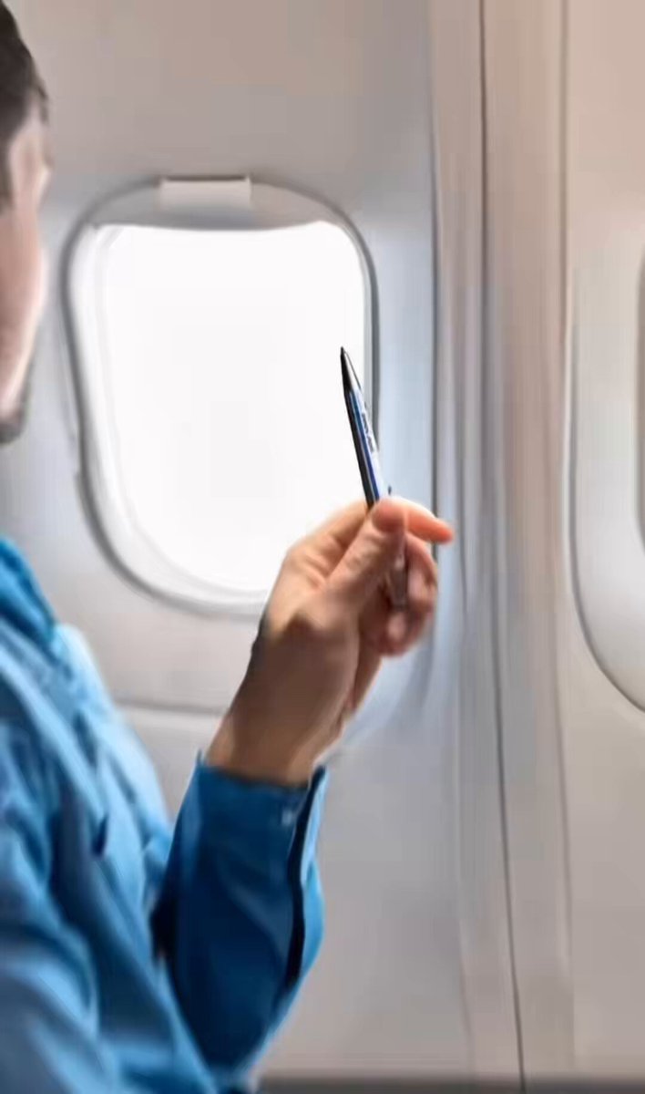 The image shows a person holding up their phone, possibly taking a picture or viewing something on the screen. The background of the photo appears to be an airplane window, suggesting that they are inside a plane during a flight. The caption above the image reads "All eyes are on BERLIN! #POLKADOT $DOT The absolute top minds of the space are flying in right now for the ultimate Web3 Summit. No bears allowed!! We are here to build." This implies that the person is attending an event related to web3 technology, possibly a summit or conference.
