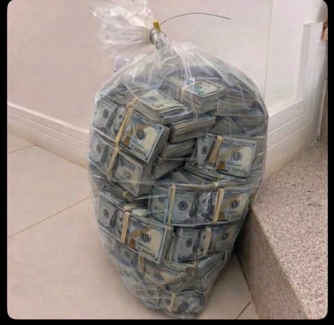 The image features a large bag filled with stacks of US dollar bills. The money appears to be in various denominations, indicating that it could be a substantial amount. The bag is placed on a tiled floor, suggesting an indoor setting such as a room or a public space like a store or a market. The post includes text about "jump for today it will find you" and "claim by letting go of 888!!". This message seems to be related to the money in the bag, possibly encouraging people to take action or make a claim against the funds.