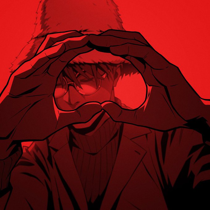 A stylized anime illustration bathed in red light showing a person with glasses forming a heart shape with their hands.