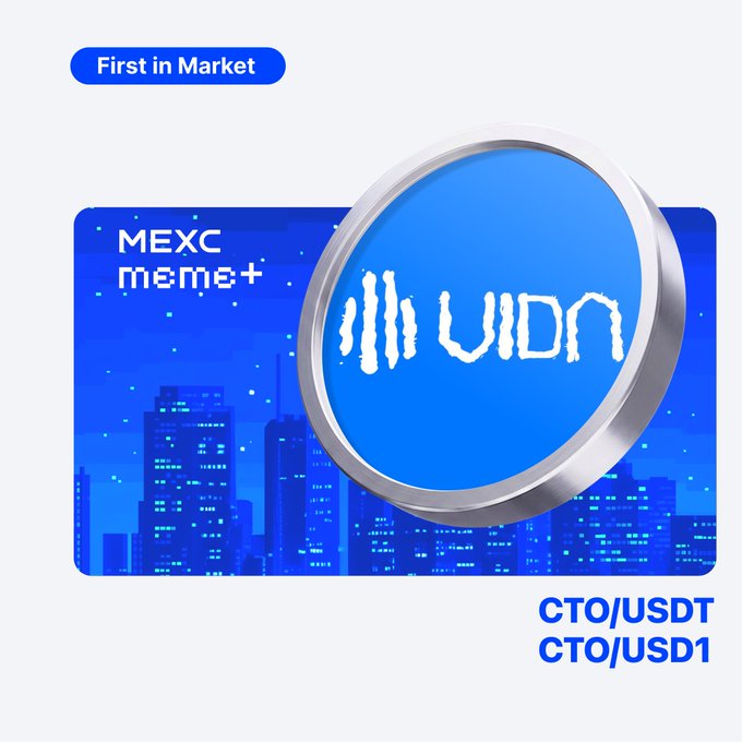 MEXC Meme+ promotional graphic featuring a blue circular 'VIDN' logo with text 'First in Market' and trading pairs 'CTO/USDT' and 'CTO/USD1' over a blue city skyline background.