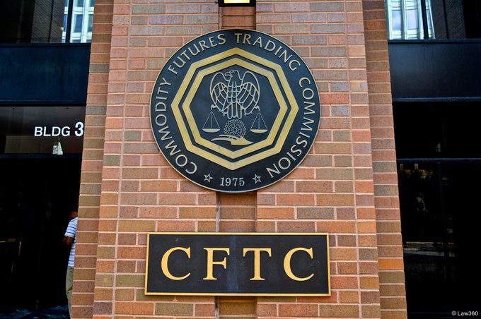 The seal of the Commodity Futures Trading Commission (CFTC) displayed on a brick building, dated 1975, with 'BLDG 3' visible.