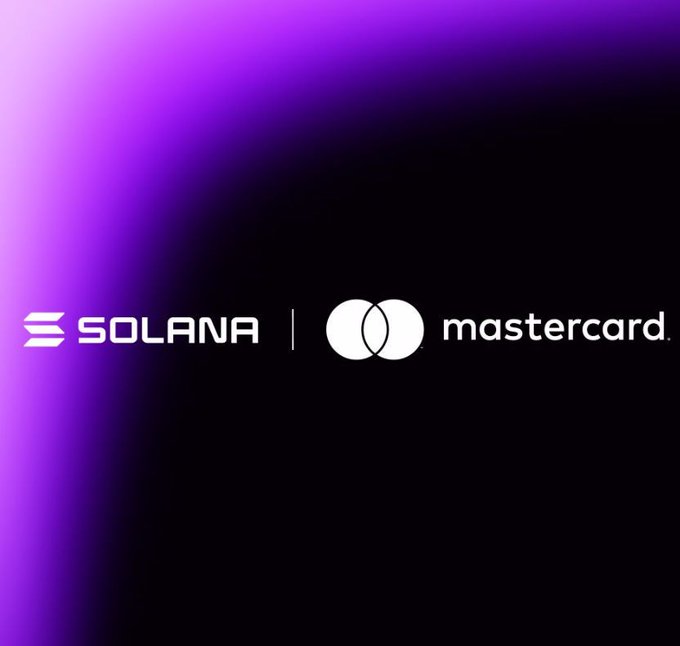 The image features a purple background with white text, including the words "Mastercard" and "SOLANA". The text is arranged in two columns, with the first column containing the word "Mastercard" followed by an exclamation mark, and the second column displaying the word "SOLANA" along with a pair of white circles. The image also includes a watermark that reads "Focus on what is in the image and how it relates to the post".