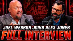 The thumbnail shows Alex Jones and Joel Webb on his show, with bold text reading "JOEL WEBBON JOINS ALEX JONES FULL INTERVIEW." The image relates to the post as a flashback visual promoting Jones's earlier warnings about cashless systems and CBDCs, themes central to the accompanying message about digital currency and surveillance.