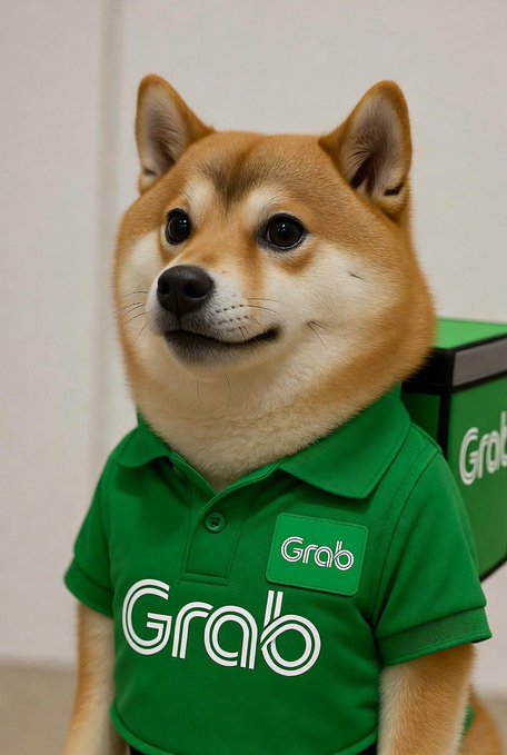 A Shiba Inu dog wearing a green "Grab" delivery uniform polo shirt and matching insulated delivery bag.