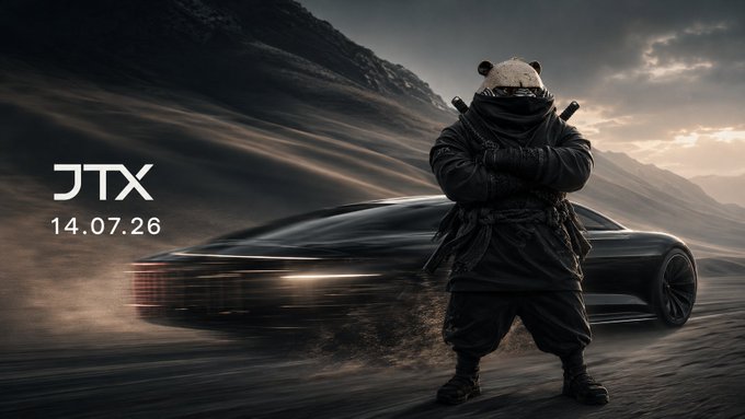 A promotional image for JTX dated 14.07.26, featuring a panda-headed figure dressed as a ninja warrior standing in front of a sleek black sports car in a desert landscape.