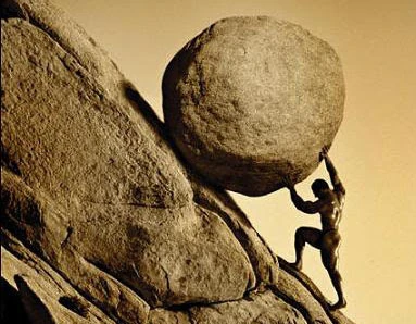 A sepia-toned photograph showing a man struggling to push a large boulder up a rocky slope, evoking the myth of Sisyphus.