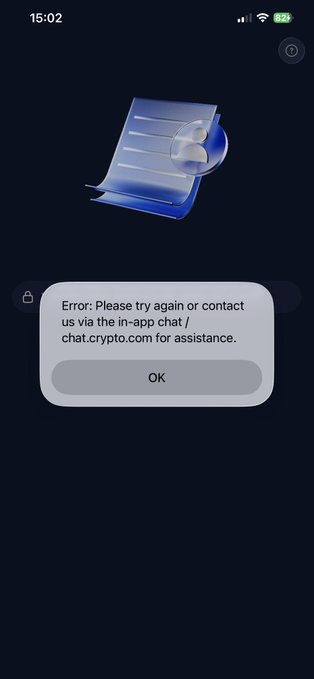 A smartphone screenshot showing an error message from what appears to be a crypto app, stating 'Error: Please try again or contact us via the in-app chat / chat.crypto.com for assistance.'
