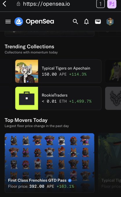 A mobile screenshot of OpenSea.io displaying trending NFT collections like 'Typical Tigers on Apechain' and 'RookieTraders' in the 'Top Movers Today' section.